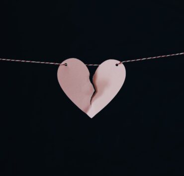 broken heart hanging on wire