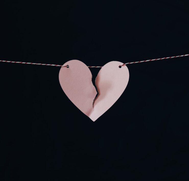 broken heart hanging on wire